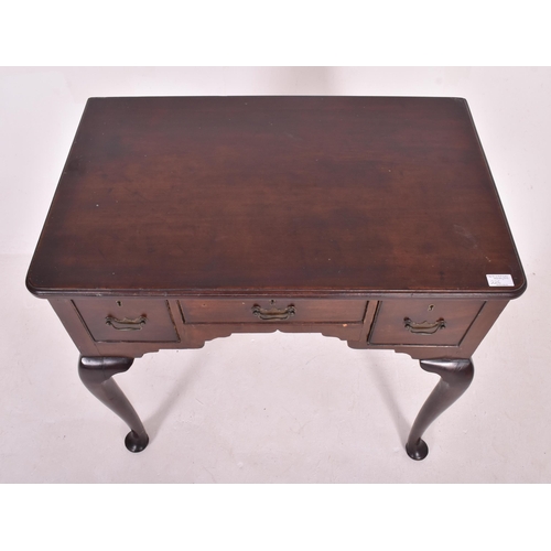 226 - A Queen Anne Revival 19th century mahogany lowboy writing table desk. The desk having a straight top... 