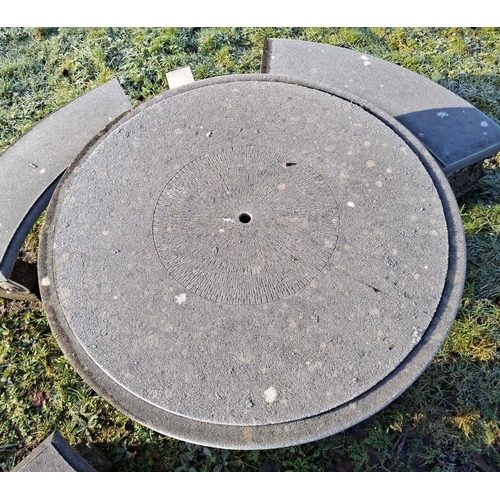 234 - A large 20th century composite stone circular garden outdoor table with curved benches. The table ra... 