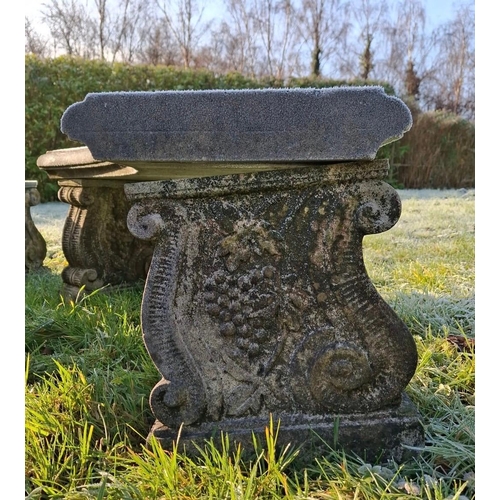 234 - A large 20th century composite stone circular garden outdoor table with curved benches. The table ra... 