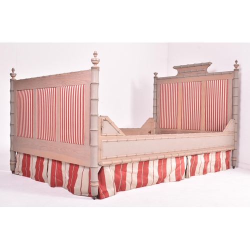 237 - A contemporary bespoke made French empire revival painted double size bed. The painted bed having a ... 