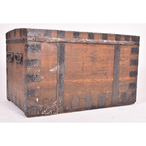 240 - A large 19th century Victorian oak & iron bound  campaign travel trunk chest. The trunk having a... 