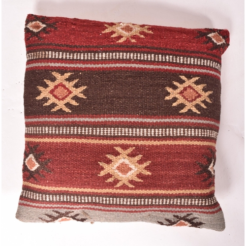 244 - A collection of country house matched set of seven late 20th-century Kilim carpet squab cushions. Si... 