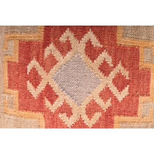 244 - A collection of country house matched set of seven late 20th-century Kilim carpet squab cushions. Si... 