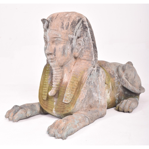 245 - A pair of large 20th century hollow cast bronze garden Egyptian sphinxes. Of hollow cast bronze cons... 