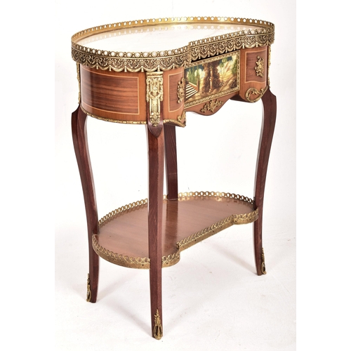 246 - A 20th century French Louis XVI style kidney shaped small ormolu side occasional table. The table wi... 