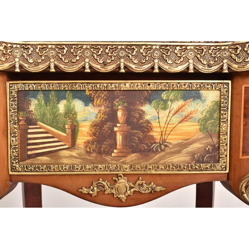 246 - A 20th century French Louis XVI style kidney shaped small ormolu side occasional table. The table wi... 