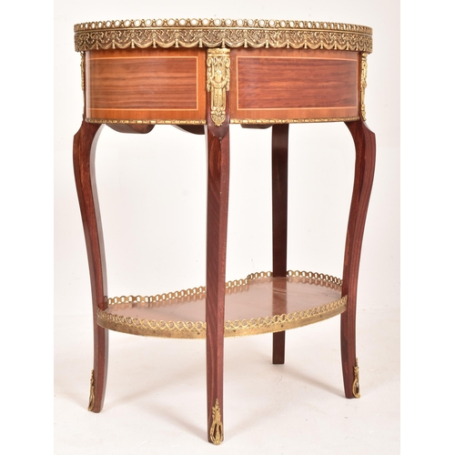 246 - A 20th century French Louis XVI style kidney shaped small ormolu side occasional table. The table wi... 