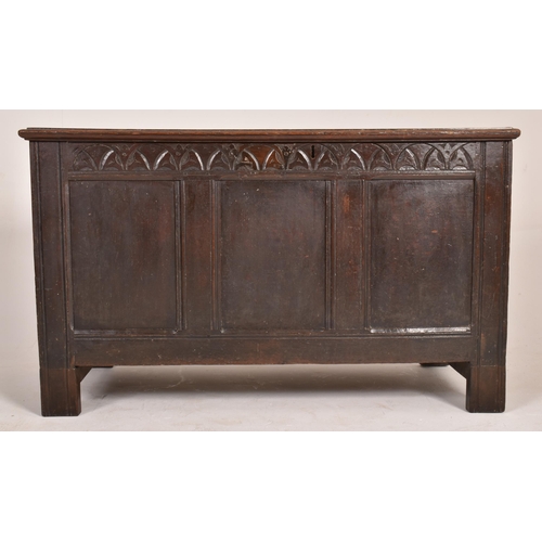 257 - A late 17th century large oak coffer chest. The coffer having a full length hinged lid opening to re... 