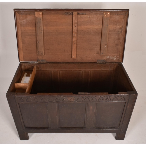 257 - A late 17th century large oak coffer chest. The coffer having a full length hinged lid opening to re... 