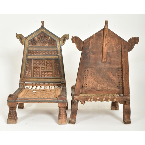 265 - A pair of early 20th century traditional Indian / Punjabi marriage chairs. Each chair with shaped ca... 