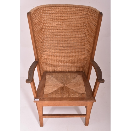 266 - A Scottish Orkney Highland early 20th century oak & seagrass woven rush back chair. The armchair... 