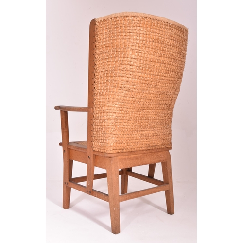 266 - A Scottish Orkney Highland early 20th century oak & seagrass woven rush back chair. The armchair... 