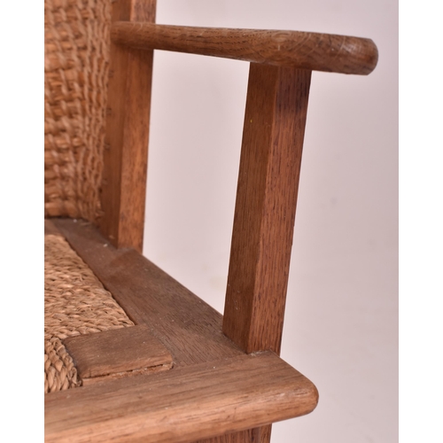 267 - A Scottish Orkney Highland early 20th century oak & seagrass woven back children's chair in the ... 