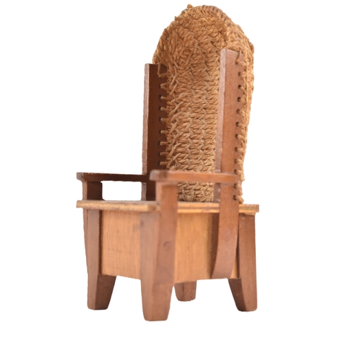 268 - A Scottish Orkney Highland oak & woven rush back miniature / salesman chair. The armchair having... 