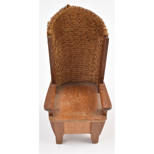 268 - A Scottish Orkney Highland oak & woven rush back miniature / salesman chair. The armchair having... 