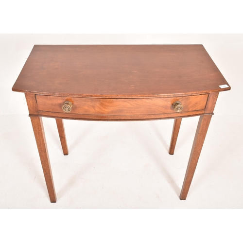 274 - A 19th century mahogany bow front side hall console table. The writing table having a bow front top ... 