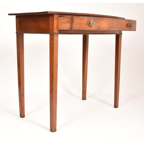 274 - A 19th century mahogany bow front side hall console table. The writing table having a bow front top ... 