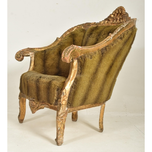 281 - A French 19th century giltwood & faux fur upholstered Provincial fauteiul bergere armchair. The ... 