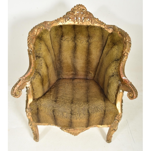 281 - A French 19th century giltwood & faux fur upholstered Provincial fauteiul bergere armchair. The ... 