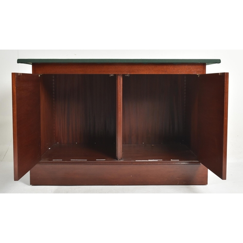 292 - A near pair of contemporary bespoke made mahogany office furnishings comprises an eight-drawer chest... 