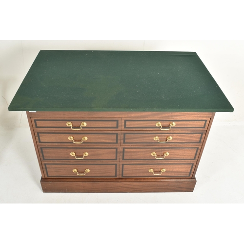 292 - A near pair of contemporary bespoke made mahogany office furnishings comprises an eight-drawer chest... 