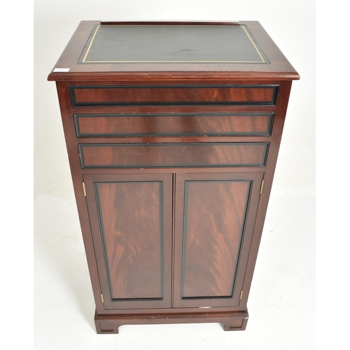 294 - A contemporary bespoke-made mahogany upright pedestal cupboard / chest. Tooled leather top with a li... 