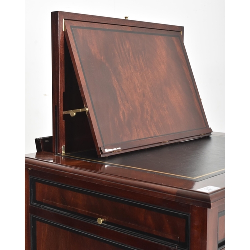 294 - A contemporary bespoke-made mahogany upright pedestal cupboard / chest. Tooled leather top with a li... 