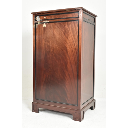 294 - A contemporary bespoke-made mahogany upright pedestal cupboard / chest. Tooled leather top with a li... 