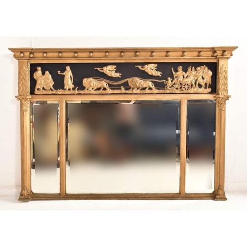 296 - A Regency 19th century gilt wood and gesso triptych overmantel wall mirror. The mirror having a flar... 