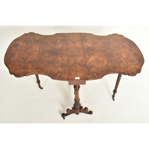 299 - A high Victorian 19th century figured walnut Sutherland drop leaf table. The table having a shaped c... 