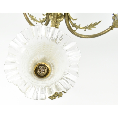 302 - An Art Nouveau early 20th century brass & frosted glass three arm ceiling electrolier chandelier... 