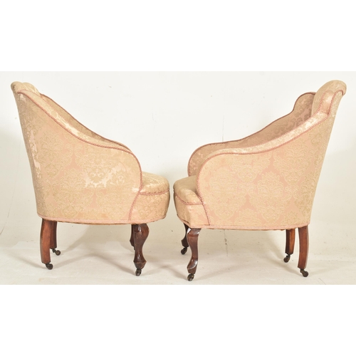 307 - A near matched pair of Queen Anne Revival early 20th century upholstered armchairs. Each having a pa... 