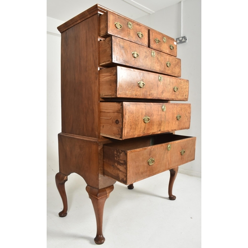 322 - An 18th century Queen Anne walnut chest of drawers on stand. The chest of drawers having a configura... 