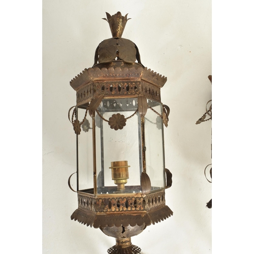 330 - A pair of Continental early 20th century embossed bronzed metal &  wooden wall lanterns / lights... 