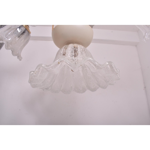 345 - Murano - An early 21st century 2000s Hollywood Regency style glass ceiling chandelier. The chandelie... 