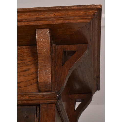 347 - An Edwardian, circa 1910 Arts & Crafts oak upright pedestal library bookcase cabinet. The cabine... 