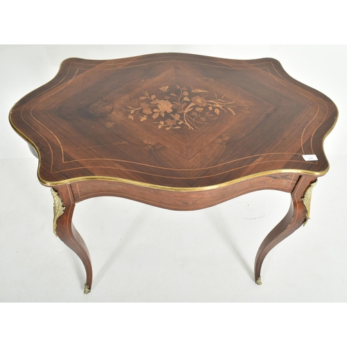 349 - A French Empire style early 20th century mahogany veneered & ormolu marquetry side table. The ta... 