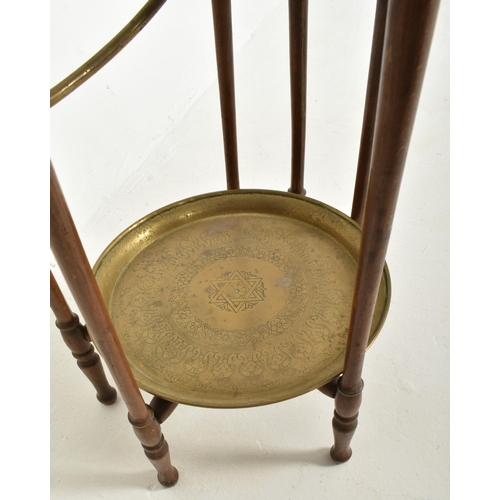 355 - An Anglo-Colonian early 20th century mahogany & brass two tier cake stand / dumbwaiter. The tabl... 