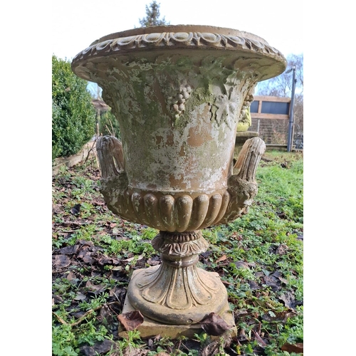 359 - A Medici inspired composite stone garden outdoor campana urn / vase. The campana urn having a gadroo... 