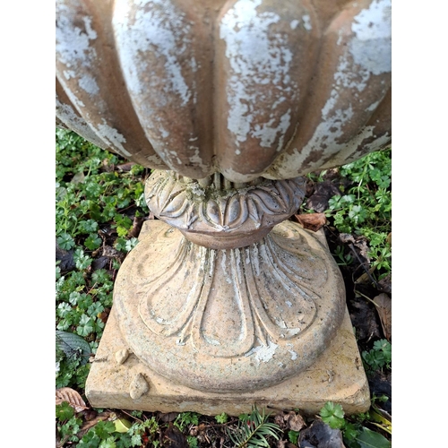 359 - A Medici inspired composite stone garden outdoor campana urn / vase. The campana urn having a gadroo... 