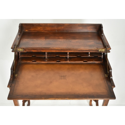 364 - An Edwardian early 20th century mahogany Campaign metamorphic writing table desk. The desk having a ... 