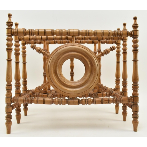 374 - A 19th century Victorian turned walnut Aesthetic movement Canterbury magazine rack stand. The stand ... 