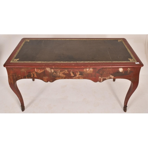 385 - An early 20th century Chinoiserie red lacquered writing desk table. The table having a rectangular t... 