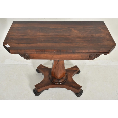 387 - A William IV 19th century rosewood fold top card games table. The table having a canted top opening ... 