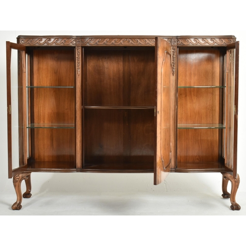 393 - A Queen Anne Revival early 20th century walnut bow fronted glass breakfront display bookcase cabinet... 