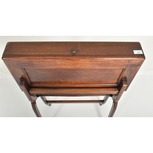 399 - A 19th century Victorian mahogany campaign folding writing table desk. The desk compartment raised o... 