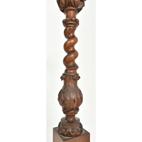 404 - A 19th century carved mahogany barely twist torchere plant stand. The pedestal having a circular top... 