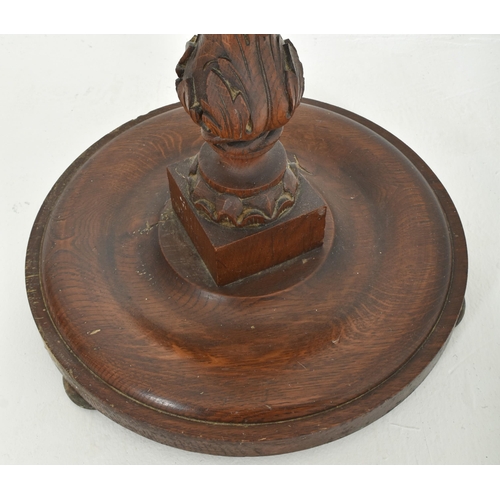 404 - A 19th century carved mahogany barely twist torchere plant stand. The pedestal having a circular top... 