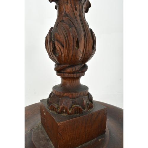 404 - A 19th century carved mahogany barely twist torchere plant stand. The pedestal having a circular top... 