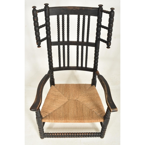 406 - An Arts & Crafts late 19th / early 20th century circa 1900 ebonised bobbin turned armchair. The ... 